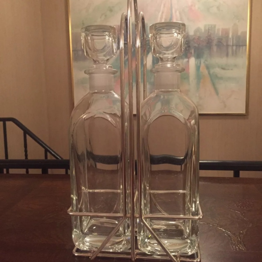 Pair Whiskey Decanters In Silver Plated Holder